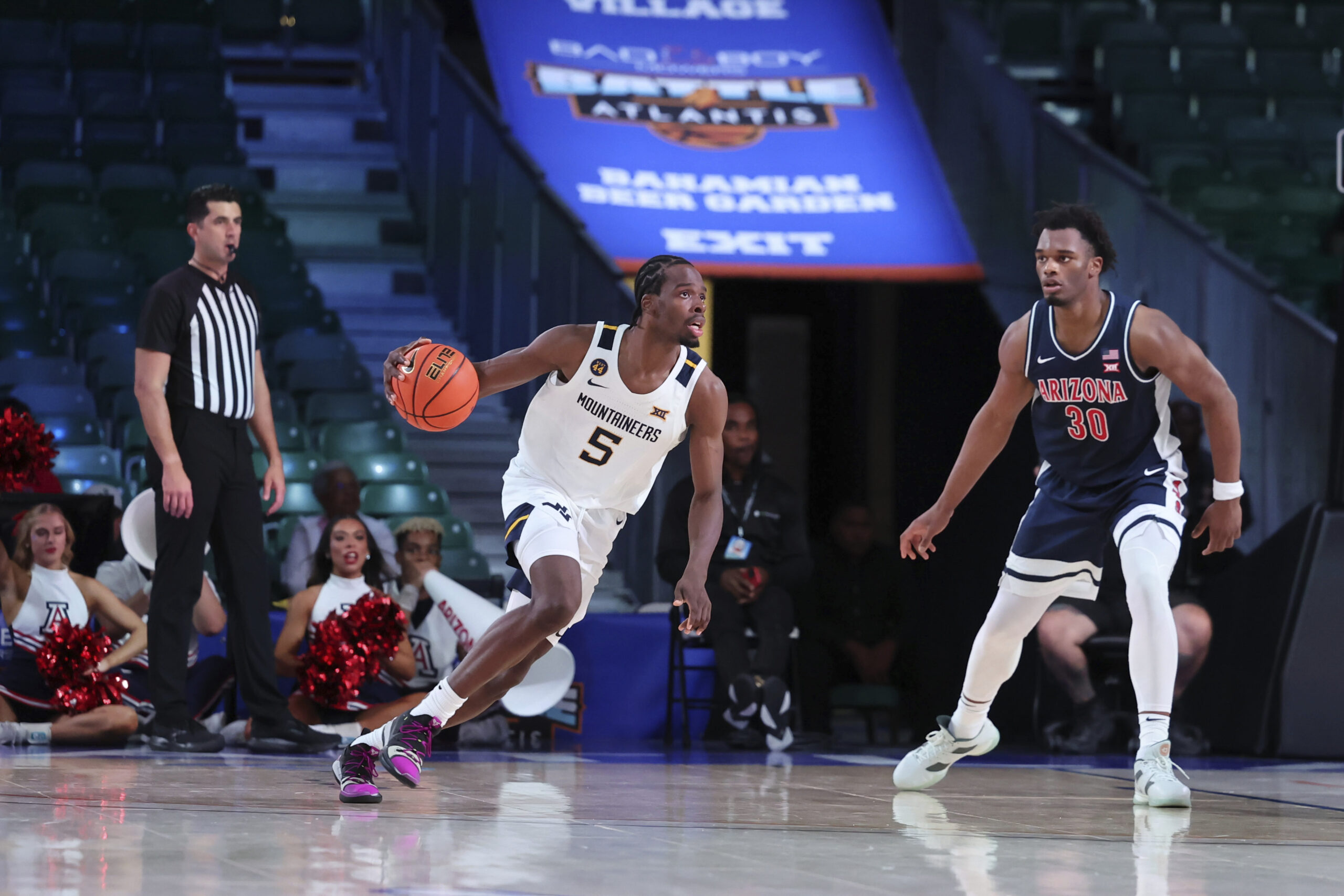 De-Threes: Tucker DeVries nails eight 3-pointers to lead WVU past No. 24 Arizona in overtime